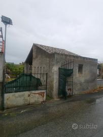 Terreno + fabbricato adiacente S. S. 114