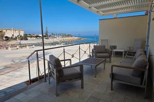 Casa fronte spiaggia Baia Cornino per 9 ospiti