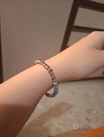 Bracciale elastico con perline sfaccettate lilla e