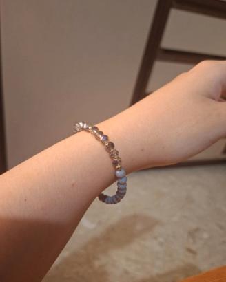 Bracciale elastico con perline sfaccettate lilla e