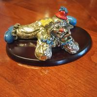 Fermacarte in argento e smalti 