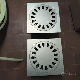 Coppia chiusini a sifone in acciaio inox con cesta