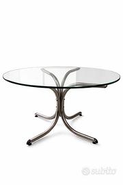 Tavolo tondo in cristallo con base in metallo