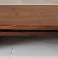 Mobiletto girevole per tv in massello di noce.