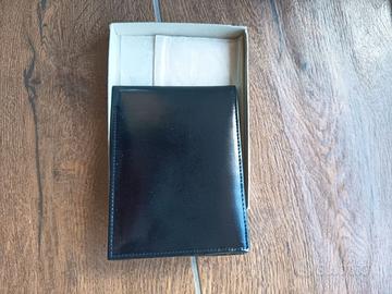 Portafoglio nero in pelle