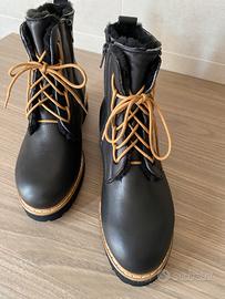 Scarponcini donna in pelle nera foderati in pelo