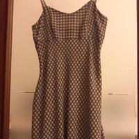 Abito con spalline e doppia gonna