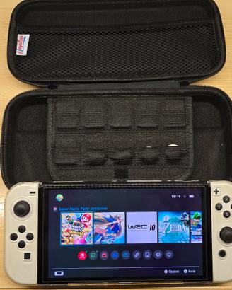 Nintendo switch oled + 3 giochi