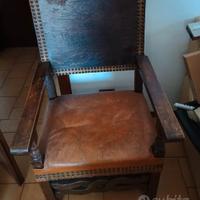 poltrona trono legno e pelle molto bella