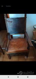 poltrona trono legno e pelle molto bella