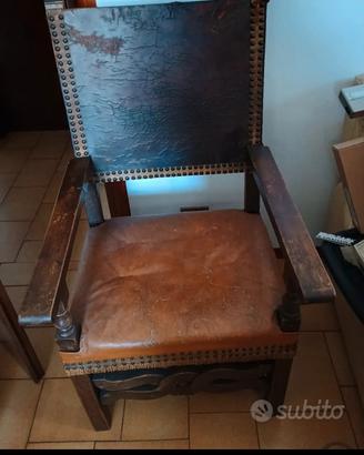 poltrona trono legno e pelle molto bella