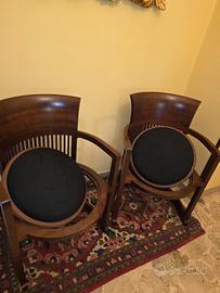 Coppia di poltrone Cassina modello "Barrel Chair".