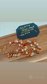 bracciale con grappoli di pietre 