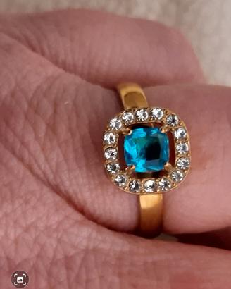 anello oro con turchese e brillanti.