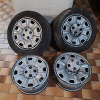 CERCHI ORIGINALI Fiat Barchetta con coprimozzo
