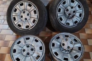 CERCHI ORIGINALI Fiat Barchetta con coprimozzo