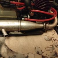 marmitta con una ammaccatura nella parte interna 