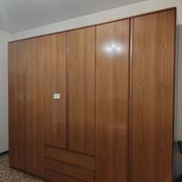 armadio 6 ante con 3 cassetti