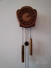 Orologio antico a pendolo