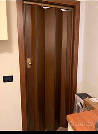 Porta a soffietto in legno