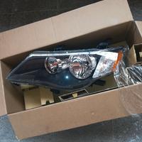 Faro sinistro Mitsubishi Outlander