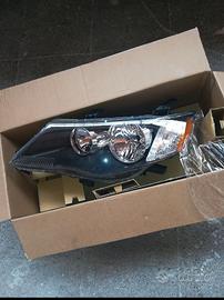 Faro sinistro Mitsubishi Outlander