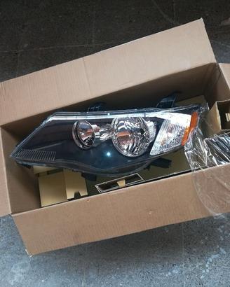 Faro sinistro Mitsubishi Outlander