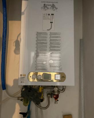Caldaia a condesazione  Ariel eco wind aurum c28