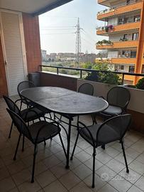 tavolo da esterno in ferro battuto