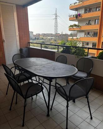 tavolo da esterno in ferro battuto