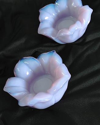 Splendida coppia di porta candele in vetro rosa 