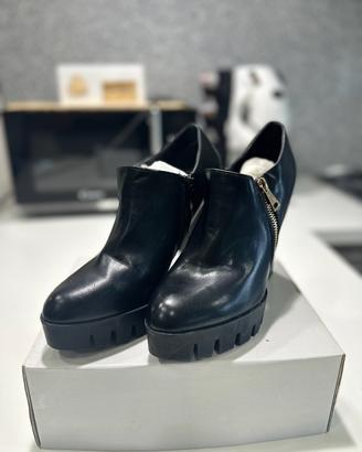Tacco Nero Nuovo