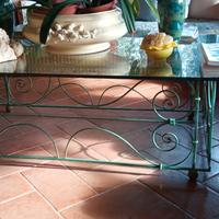 tavolo in vetro e ferro battuto