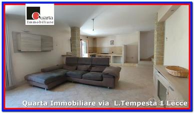 Appart. su 2 livelli, taverna e giardino e box