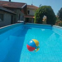 Ampia Bifamiliare con Giardino di 2000 m² e Grandi