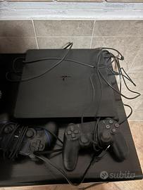Play station 4 + 5 giochi + joystick
