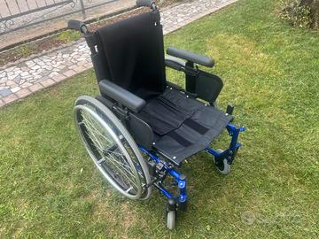 Carrozzina per adulto