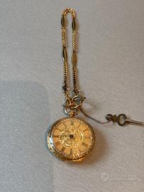 Orologio taschino in ORO 18K finemente cesellato
