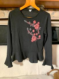 Maglia con decorazioni 