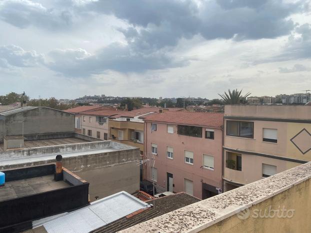 Luminoso Bilocale con Terrazza e Posto Auto