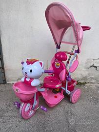 Triciclo rosa bambina con manubrio adulto