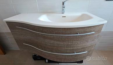 Mobile lavabo in legno curvo