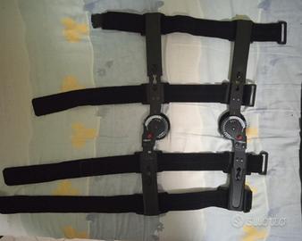 Tutore per ginocchio con stecche laterali