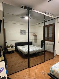 Camera matrimoniale Poliform e letto Pozzoli