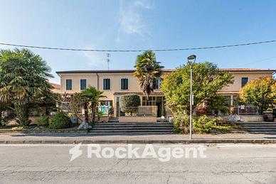 PORZIONE DI CASA A SCHIERA CON GIARDINO