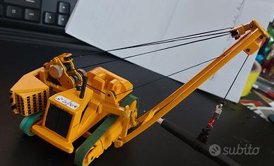 escavatore posatubi 1/70 caterpillar