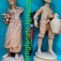coppia statuine