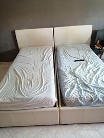 2 letti singoli apribili con contenitore