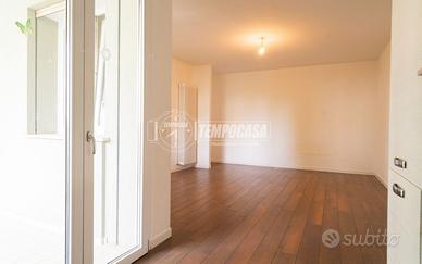 APPARTAMENTO AL PIANO TERRA CON GIARDINO PRIVATO,