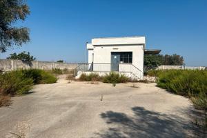 Immobile e terreno ex deposito carburanti